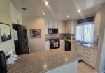 #571 – COMFORTABLE 2-BEDROOM, END-UNIT CONDO, WEST FACING PATIO WITH UPGRADES.  RENTED FOR 26-27 SEASON