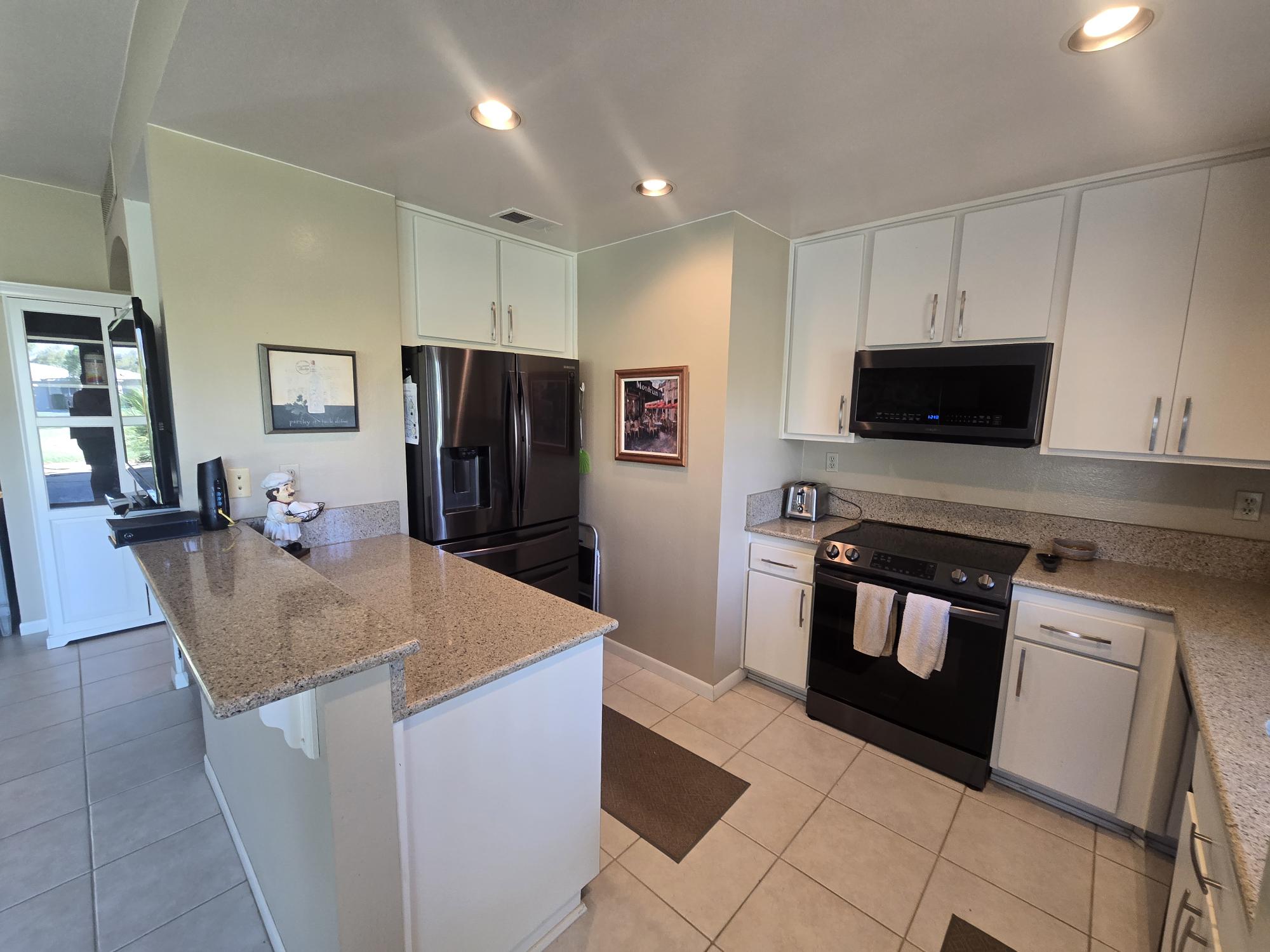 #571 – COMFORTABLE 2-BEDROOM, END-UNIT CONDO, WEST FACING PATIO WITH UPGRADES.  RENTED FOR 26-27 SEASON